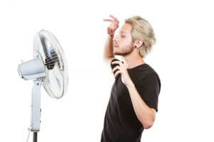 Man Using a Fan